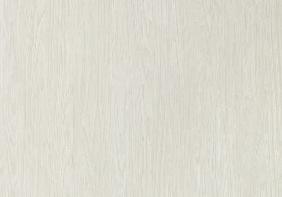 A white wall with some type of wood grain.